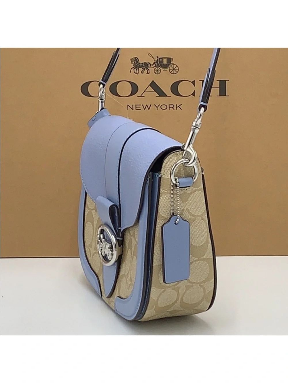COACH Georgie Saddle Bag In Signat Canvas COLOR:
Silver/Light Khaki/Marble
Blue - Picture 6 of 16